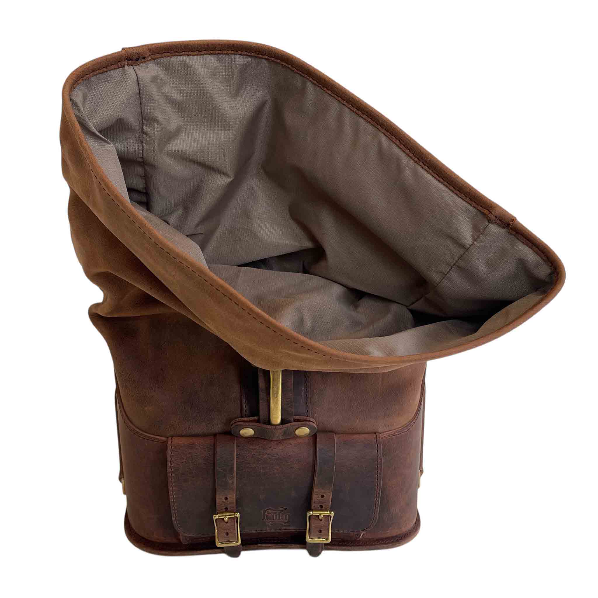 Triumph Bonneville Bobber Panniers Rolltop Swingarm Saddlebags. Hand crafted in USA with premium veg tan water buffalo leather, waterproof liners and solid brass hardware. BAD&G Customs TBP01