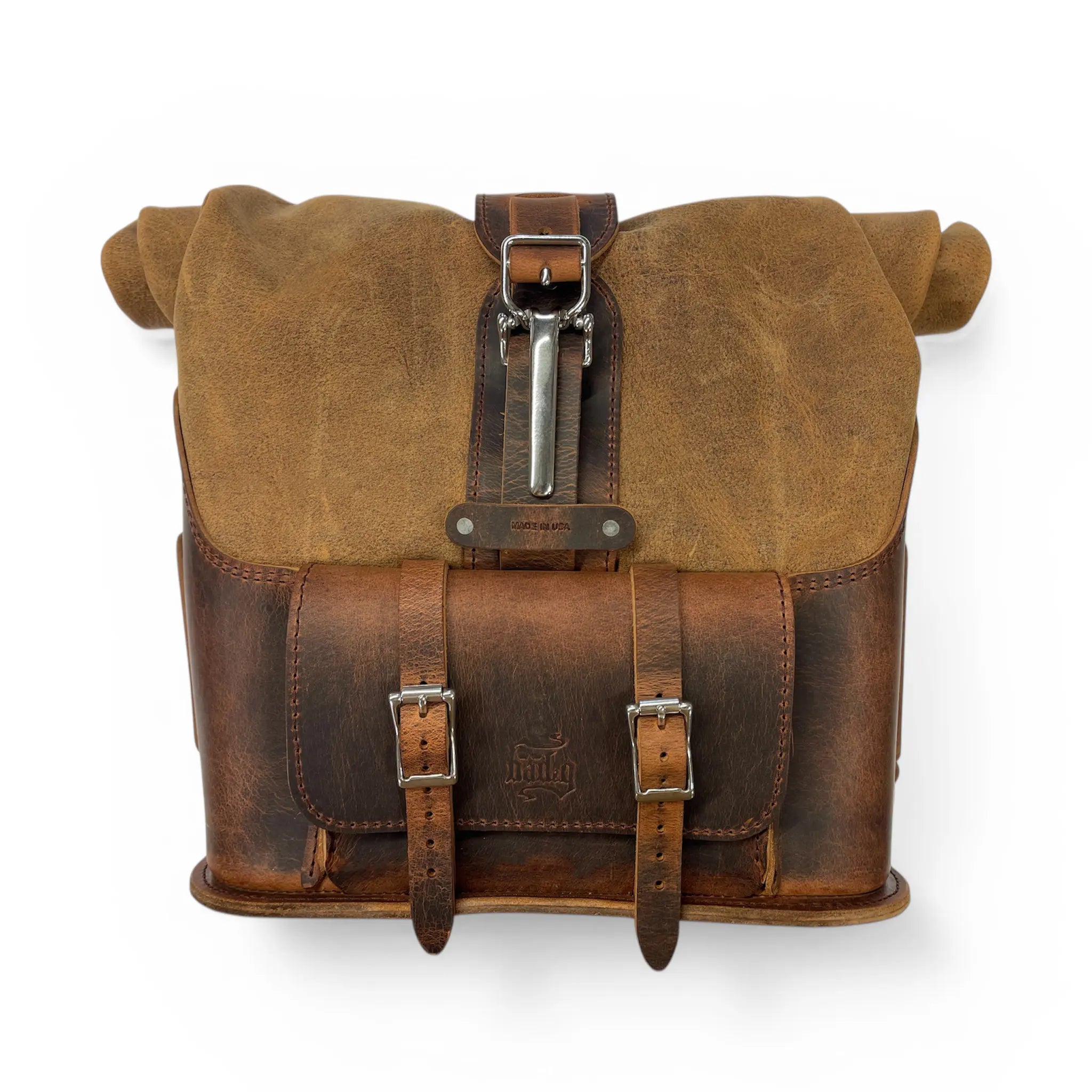 Brown leather satchel bag with a buckle on a white background