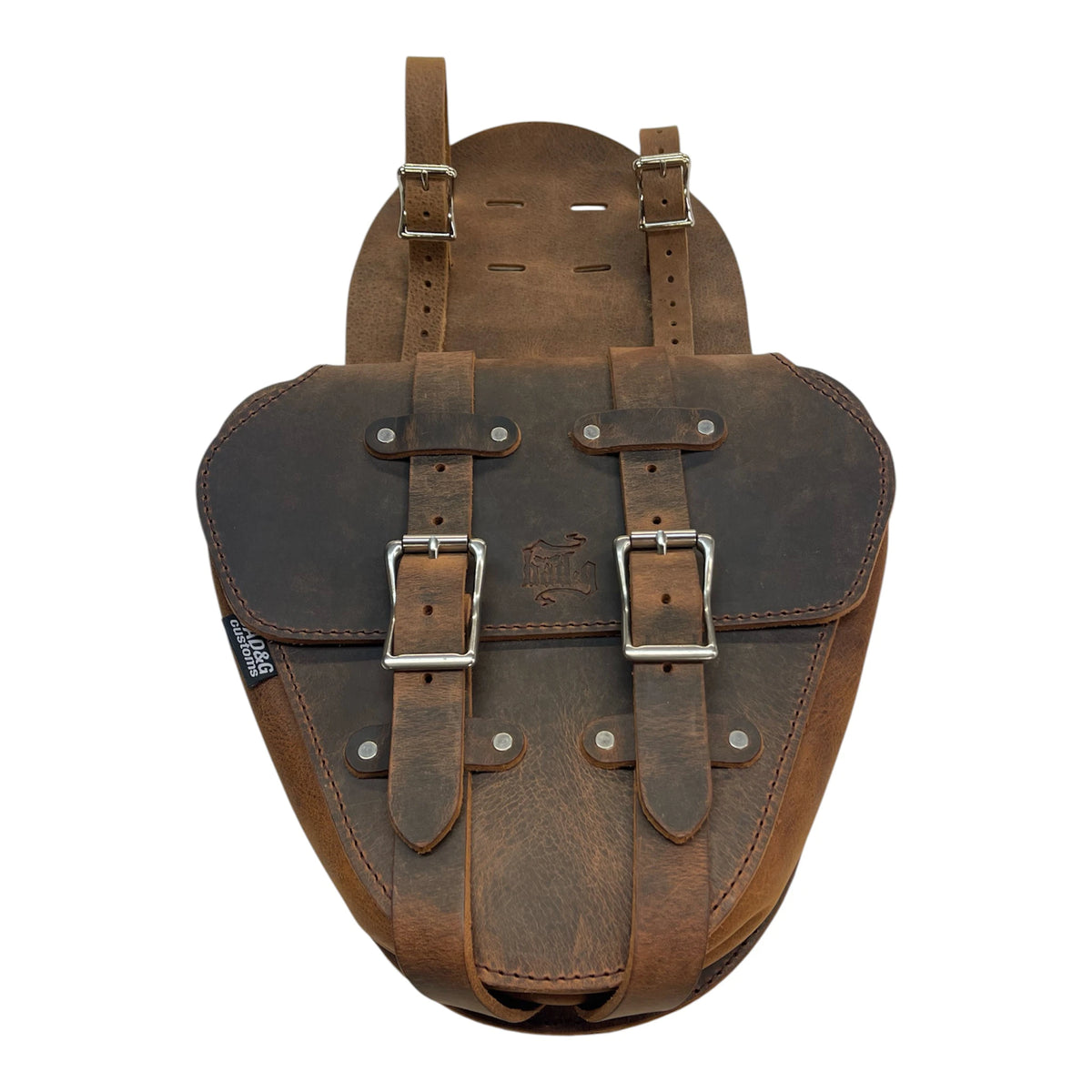 Brown leather backpack with metal buckles on a white background