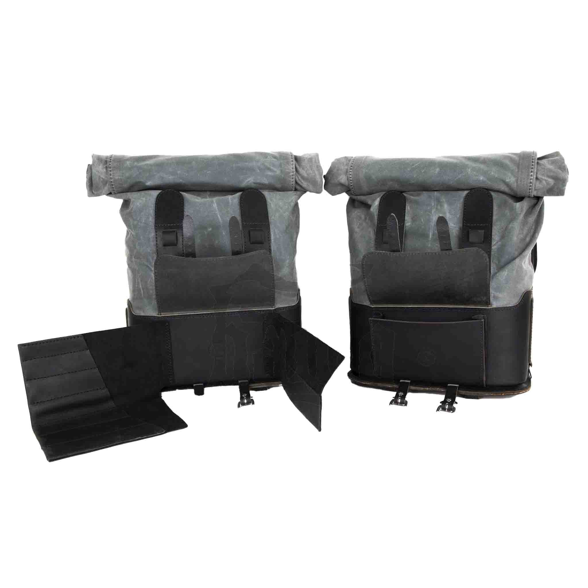 Upgrade your ride with the URB10 Rolltop Saddlebags. Unique design enables quick conversion from saddlebag to backpack. Hand crafted in USA with premium veg tan water buffalo leather, waxed canvas and stainless steel hardware. Durable and stylish, they are the perfect fit for your motorcycle.