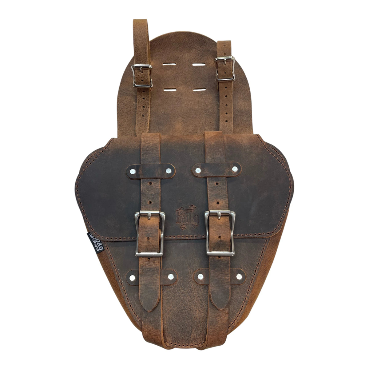 Brown leather saddlebag with metal buckles on a white background